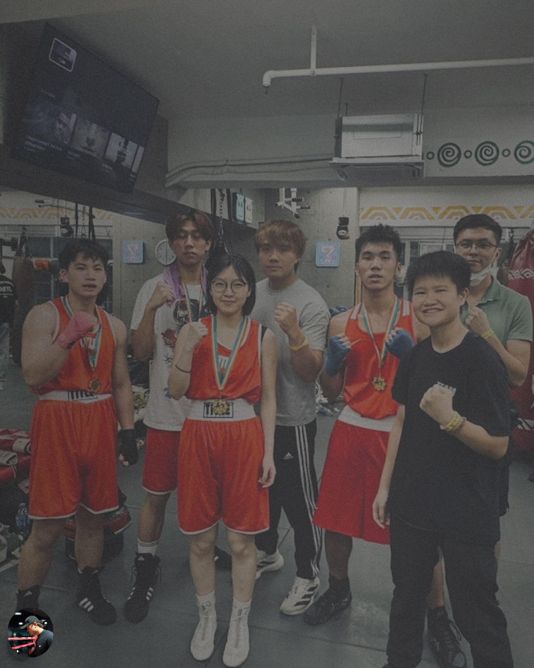 Chan Ka Wa Boxing gym team photo with Bruce Lee's quote on the power of consistent training.